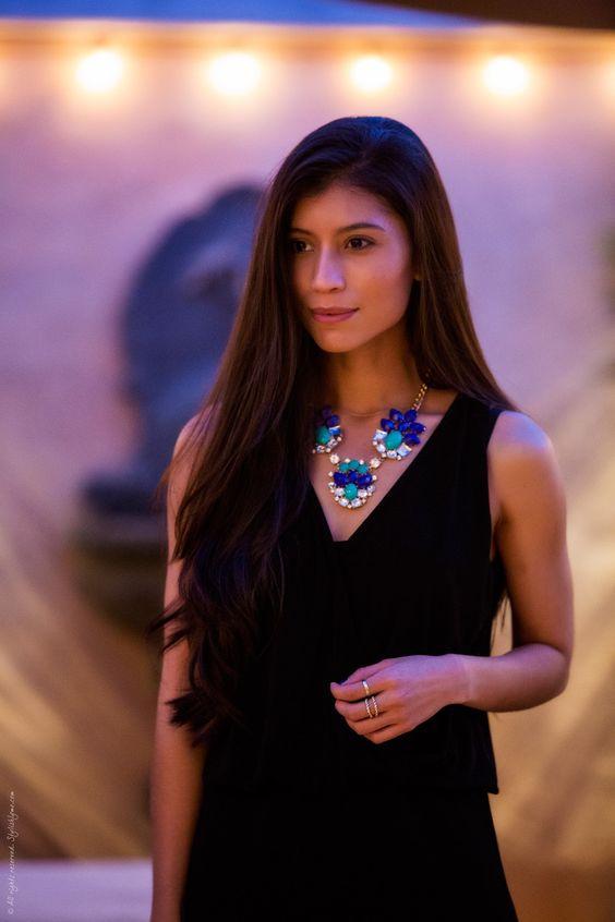 Statement necklace over a black dress